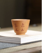 Tasse à thé de calligraphie chinoise Yixing Duan Ni